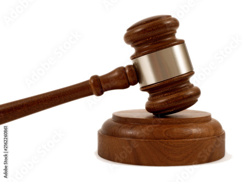 Fotografía Wooden judge gavel resting on sound block for legal justice concept