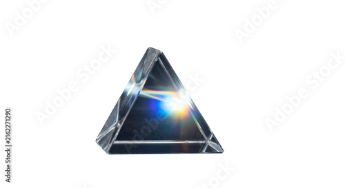 Obraz na płótnie Glass triangular prism refracting light into a rainbow spectrum of colors