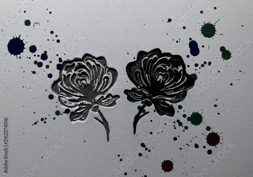 Floral design with ink splatters