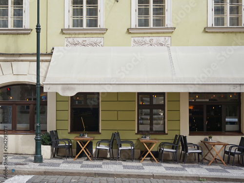 Photography street cafe in praha prague soft green color facade