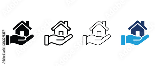 hand holding house icons in different styles and colors representing real estate or property concepts