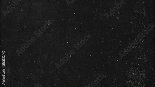 Fotografie Grunge overlay effect with scratch and dust on black background, retro noisy gra