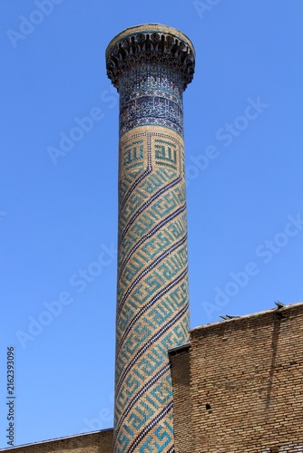 The Mausoleum of Amir Timur was built between 1399 and 1405. The tile decorations on the structure's walls are striking. The structure's minaret.
