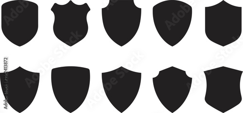Set of ten different black shield silhouettes for heraldry and security logos on a white background