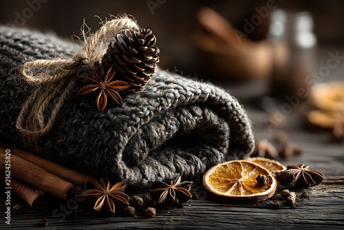 Cozy Winter Atmosphere with Knitted Blanket and Dried Orange Slices for Home Decor Inspiration