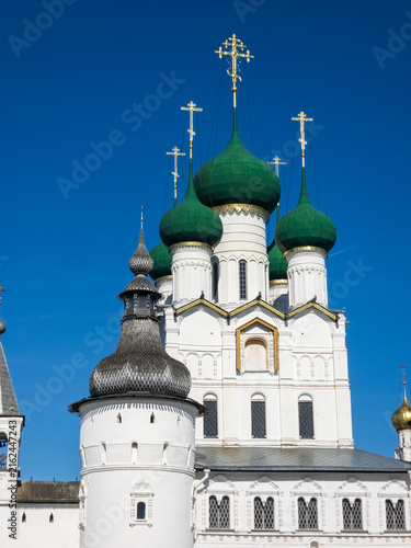 Photography Russian Orthodox Church Complex with Green Domes Against a Clear Blue Sky