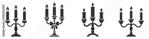 фотографія set of black candelabras with three lit candles vector illustration on transpare