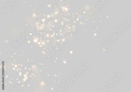 Soft golden bokeh sparkles scattered on transparent background with subtle glow on transparent background