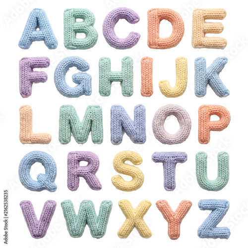 Knitted Pastel Colored Alphabet Set with Soft Yarn Texture for Nursery Design and Educational Graphics Isolated on White