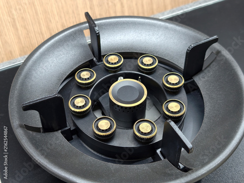 Close-up of modern black gas stove burner ring