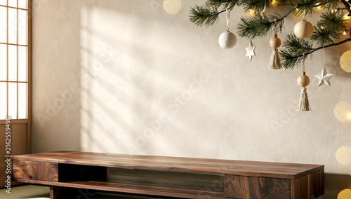 Low wooden credenza mockup in a sunlit Japandi room decorated with hanging beige tassels, white star baubles, and natural pine needles