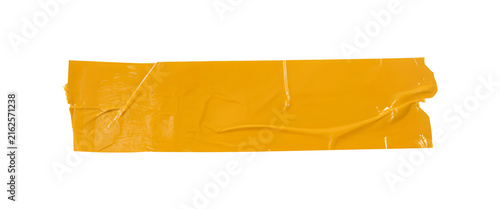 Yellow masking tape strips isolated on white background. Construction adhesive rental stickers. Painter tape office supply. Isolated industrial tape with wrinkled texture.