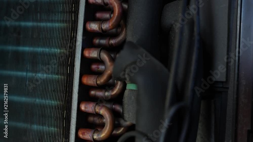 Copper cooling coils and metal fins inside an air conditioner or refrigeration unit