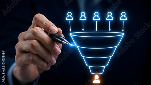 Businessman Drawing Glowing Digital Sales Funnel with User Icons Representing Targeted Lead Generation and Customer Conversion