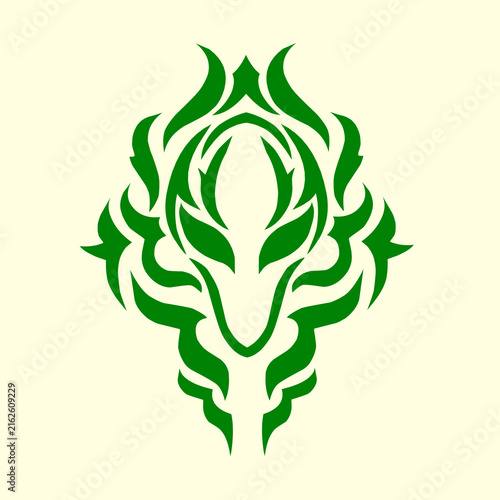 Symmetric green tribal wolf head silhouette for mythical mascot or tattoo design.
