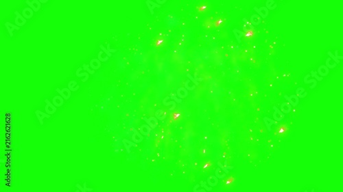 Gold sparks explode across a bright green screen background.
