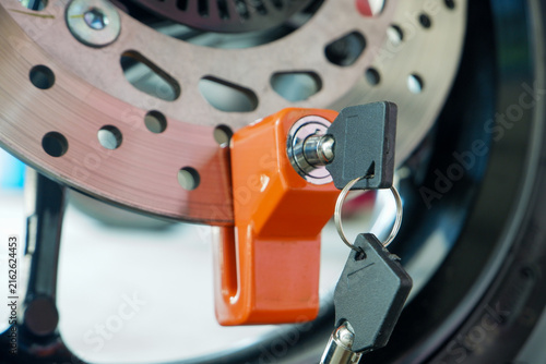 Fotografie Motorcycle Disc Brake Lock on Wheel Rotor for Vehicle Anti-Theft Security