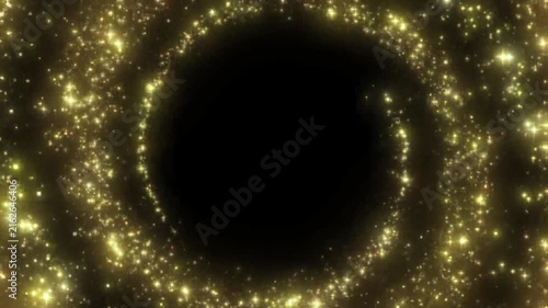Golden spiral particles create a glowing frame on black backdrop.