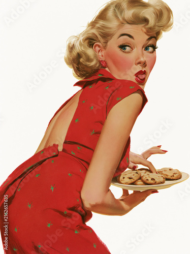 Vintage woman in red dress holding cookies with playful expression  