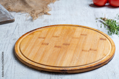 Rustic Vegetable Food Preparation Scene with Wooden Cutting Board