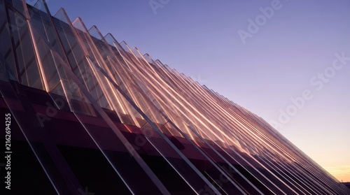 Modern Geometric Glass Building Facade with Evening Light