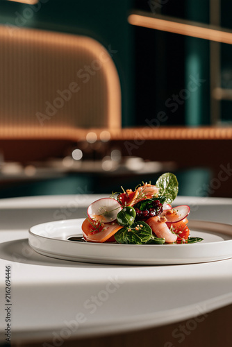 Cinematic premium food photography, extreme close up of a fresh gourmet salad on a clean white ceramic plate