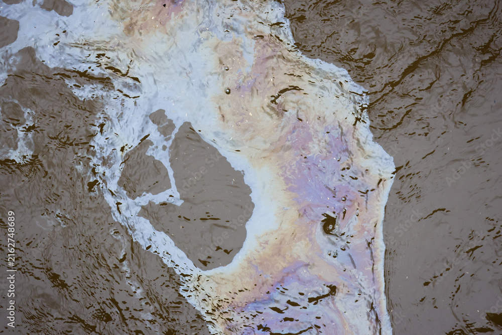 Fototapeta premium Abstract water reflection with iridescent color and rippling texture creating fluid natural pattern