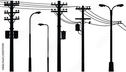 A collection of black silhouettes featuring various utility poles, electrical power transmission towers, and street lighting lamps isolated on a white background, for urban