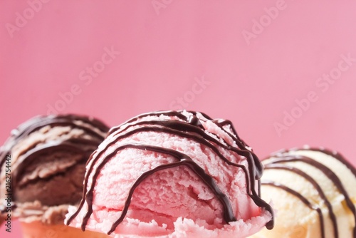 Принти на полотні close up of scoops of ice cream, featuring various flavors such as vanilla, stra