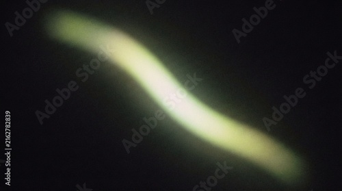 Abstract Glowing Luminous Light Trail With Soft Blurred Edges On A Dark Background Minimalist Digital Backdrop