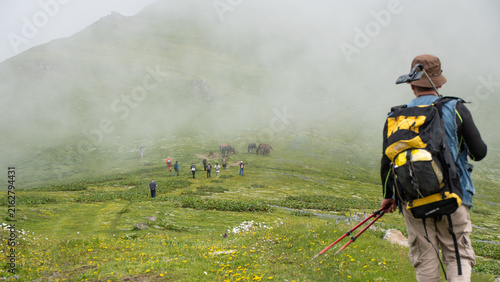 Photography young man in the mountains
