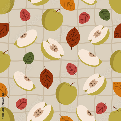 Green apple seamless pattern with whole apples, slices, and autumn leaves on grid background