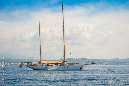 Foto Classic wooden ketch sail yacht, private boat anchored in the bay of Cannes, Fra