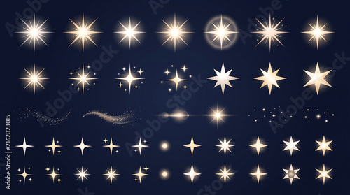 Golden Starburst Light and Sparkle Effects on Dark Background