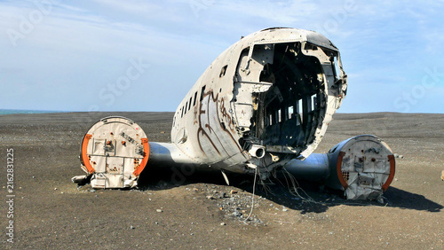 Airplane wreck on the beach in Iceland, abstract scene in landscape