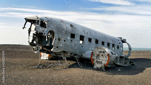 Airplane wreck on the beach in Iceland, abstract scene in landscape