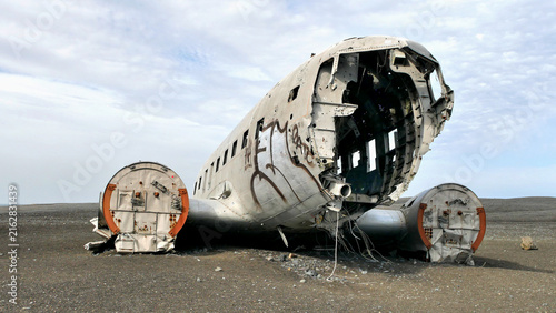 Airplane wreck on the beach in Iceland, abstract scene in landscape