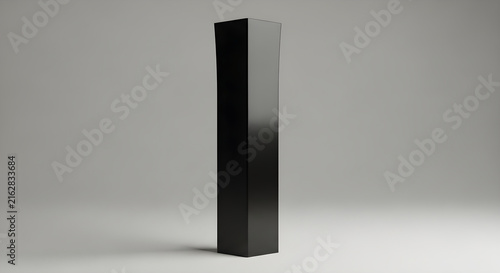 Minimalist Black Rectangular Pillar Column Sculpture Standing Alone Against A Neutral Grey Background Studio Lighting