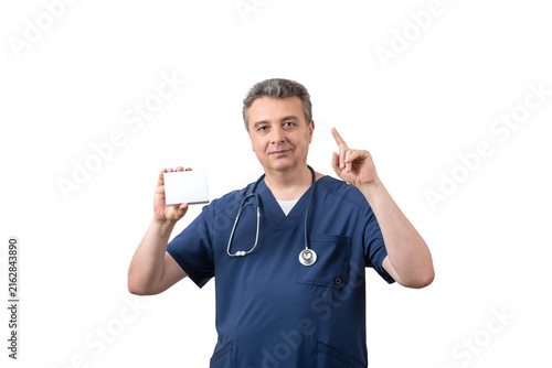 A middle-aged male doctor is holding a medicine box with a space for text.
