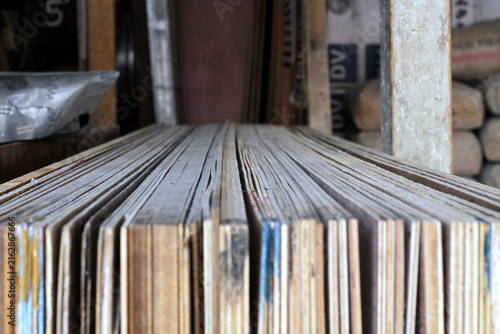 Stack Of Plywood Sheets And Lumber In A Workshop Ready For Construction Projects
