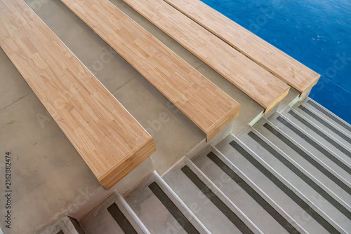 Obraz na plátne Wooden bleacher benches over a concrete stand
