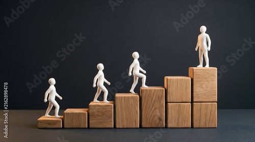Wooden people figures climbing ascending blocks toward top position representing career growth and advancement