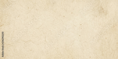 Beautiful cream paper design background with natural finish. Abstract vintage parchment with gentle worn texture. Decorative design for invitation, brochure, header and interior design.