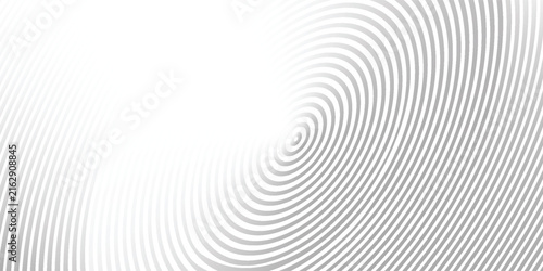 An abstract circular design forming a spiral. Thin black lines create a repeating spiral pattern against a plain white background.