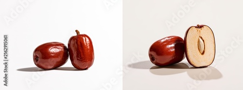 Fresh Jujube Fruits, One Whole and One Halved, on a White Background.