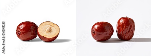 Two Ripe Red Jujube Fruits, One Cut in Half, Displayed on a White Background.