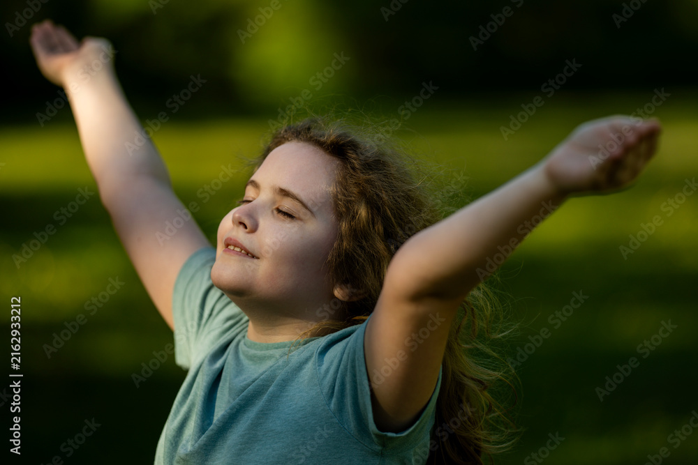 Fototapeta premium Freedom feels natural in countryside. Freedom supports happy childhood wellness. Outdoor freedom creates joyful mood. Child freedom shows outstretched arms.