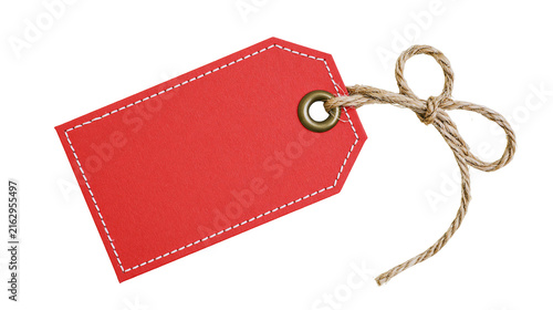 Red paper tag with white stitching and twine bow