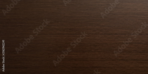 Close-up texture of dark wood grain, showcasing the natural pattern and warm tones of the material.