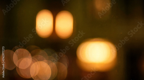 Canvas Print Golden bokeh background with warm light circles